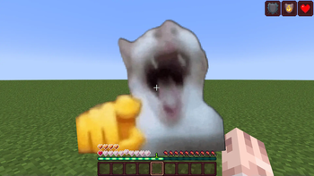 Totem of Laughing Cat Meme 🫵😸